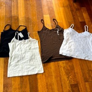 Four tanks.  L and xl
